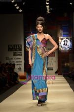 Model walks the ramp for Niki Mahajan show on Wills Lifestyle India Fashion Week 2011-Day 4 in Delhi on 9th April 2011 (55).JPG